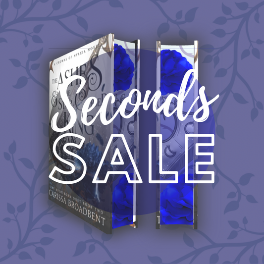 SECONDS SALE - The Ashes and the Star Cursed King Sprayed Edge Hardback (UK edition)